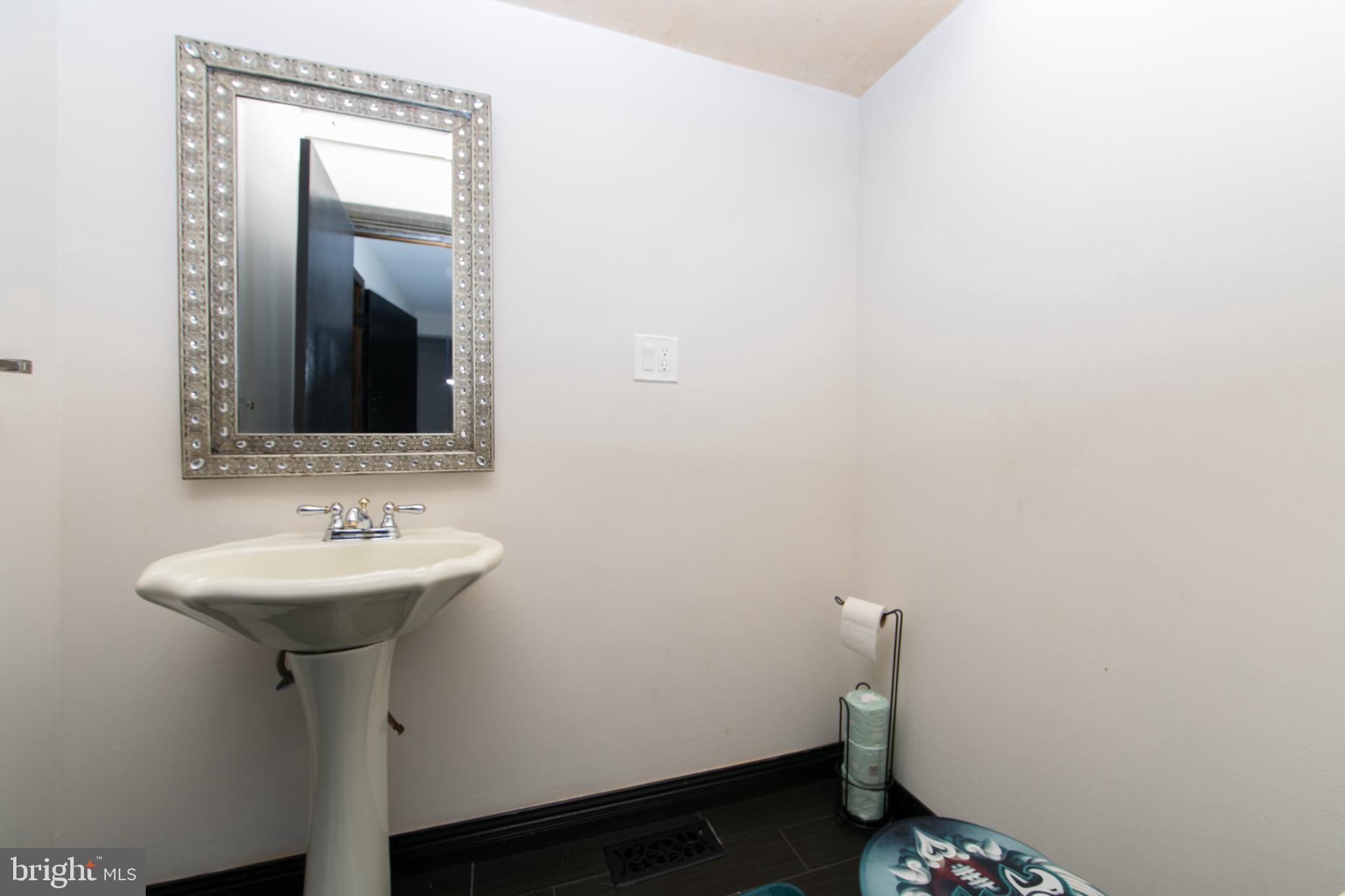 220 Landing Road Blackwood, NJ 08012 - Photo 38 of 63 a bathroom with a sink and a mirror