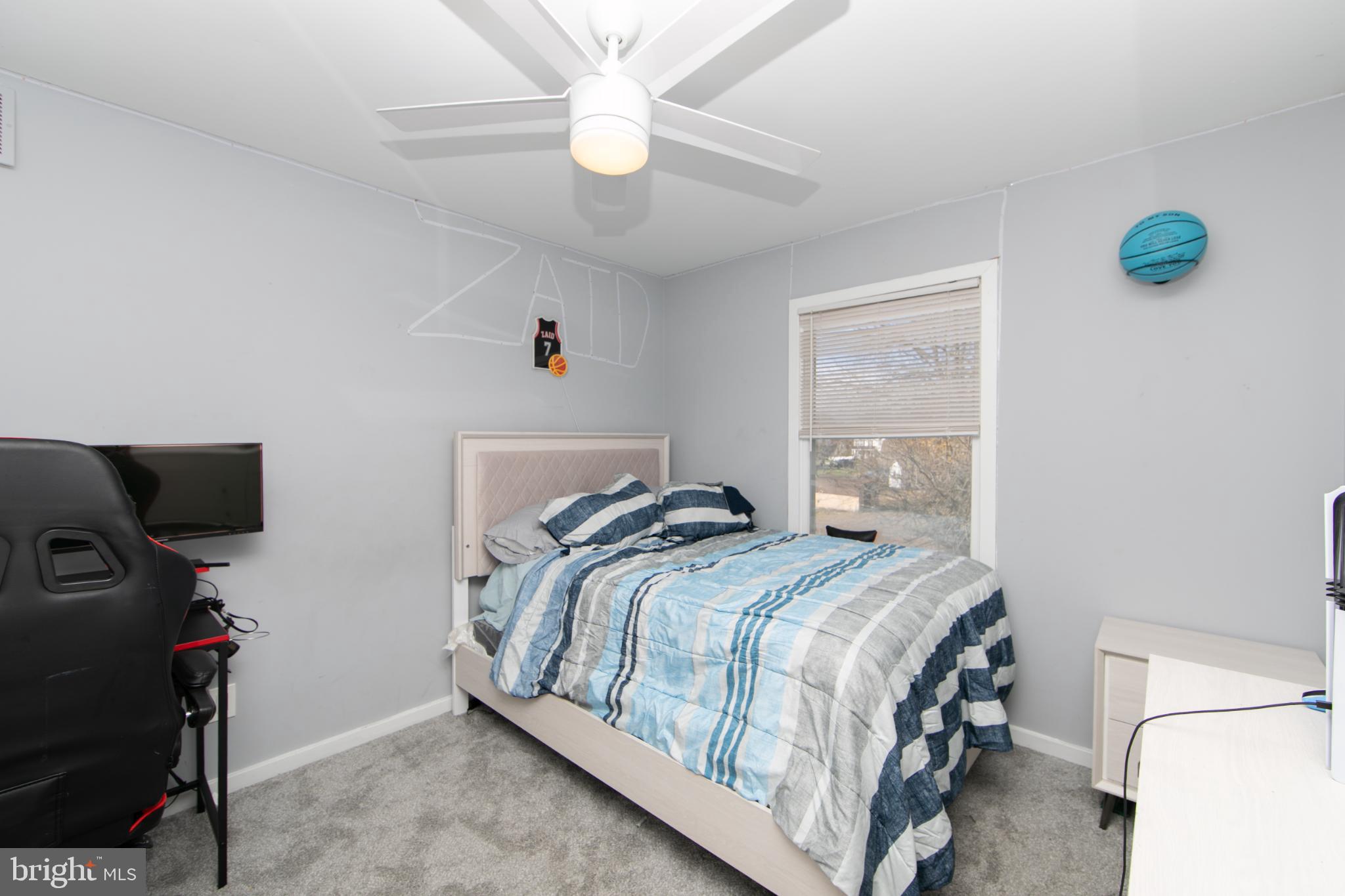 220 Landing Road Blackwood, NJ 08012 - Photo 52 of 63 a bedroom with a bed and a ceiling fan