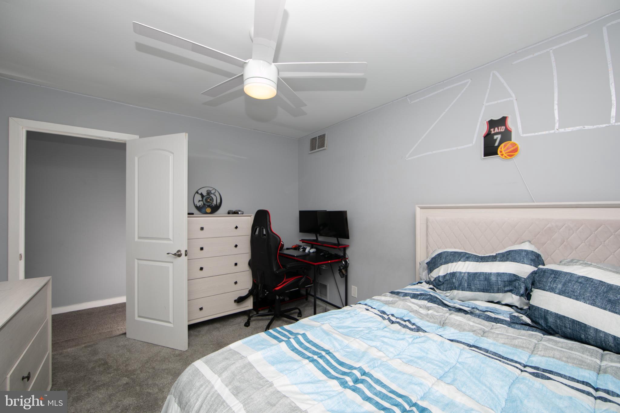 220 Landing Road Blackwood, NJ 08012 - Photo 53 of 63 a bedroom with a bed and a chandelier