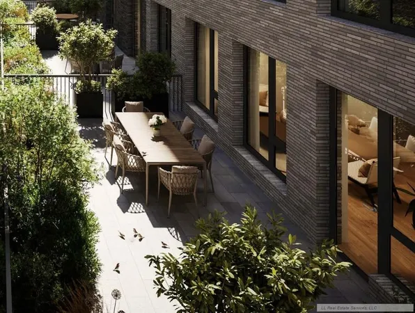 a view of a patio with table and chairs and potted plants
