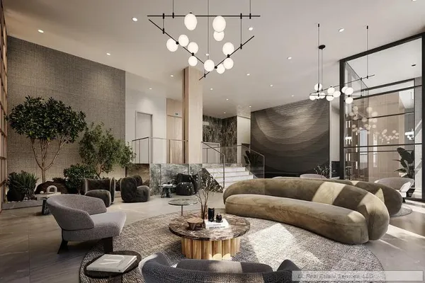 a living room with furniture and a chandelier