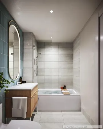 a bathroom with a bathtub and a sink