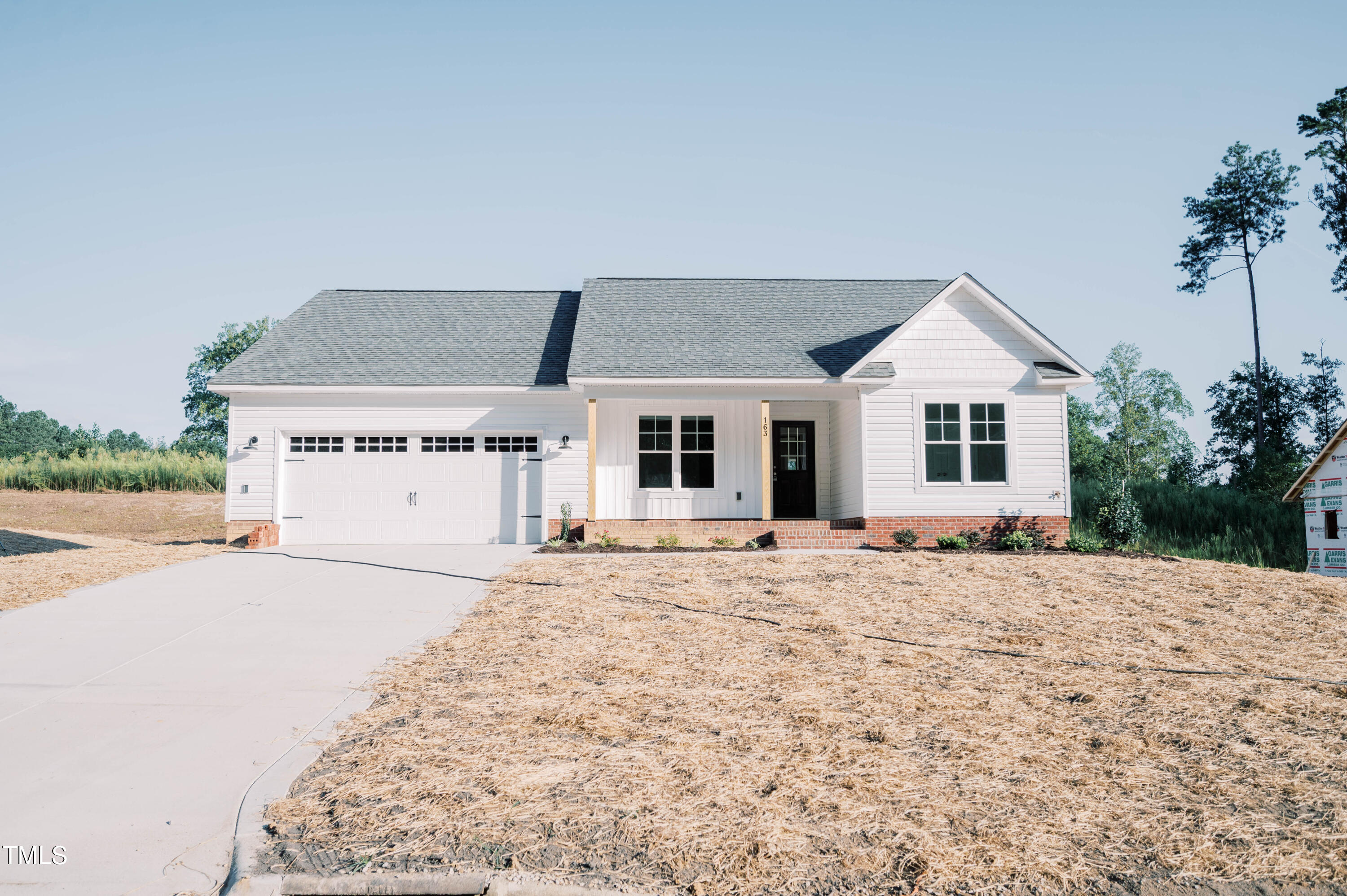 front view of house with a yard