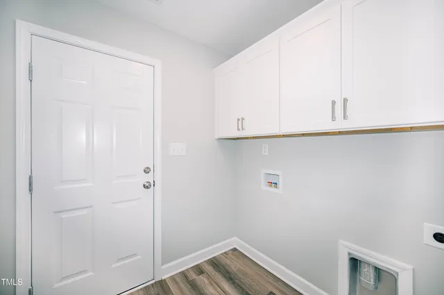 a view of small space with wooden floor