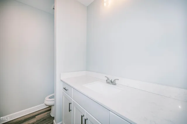 a view of a bathroom with a sink and a toilet