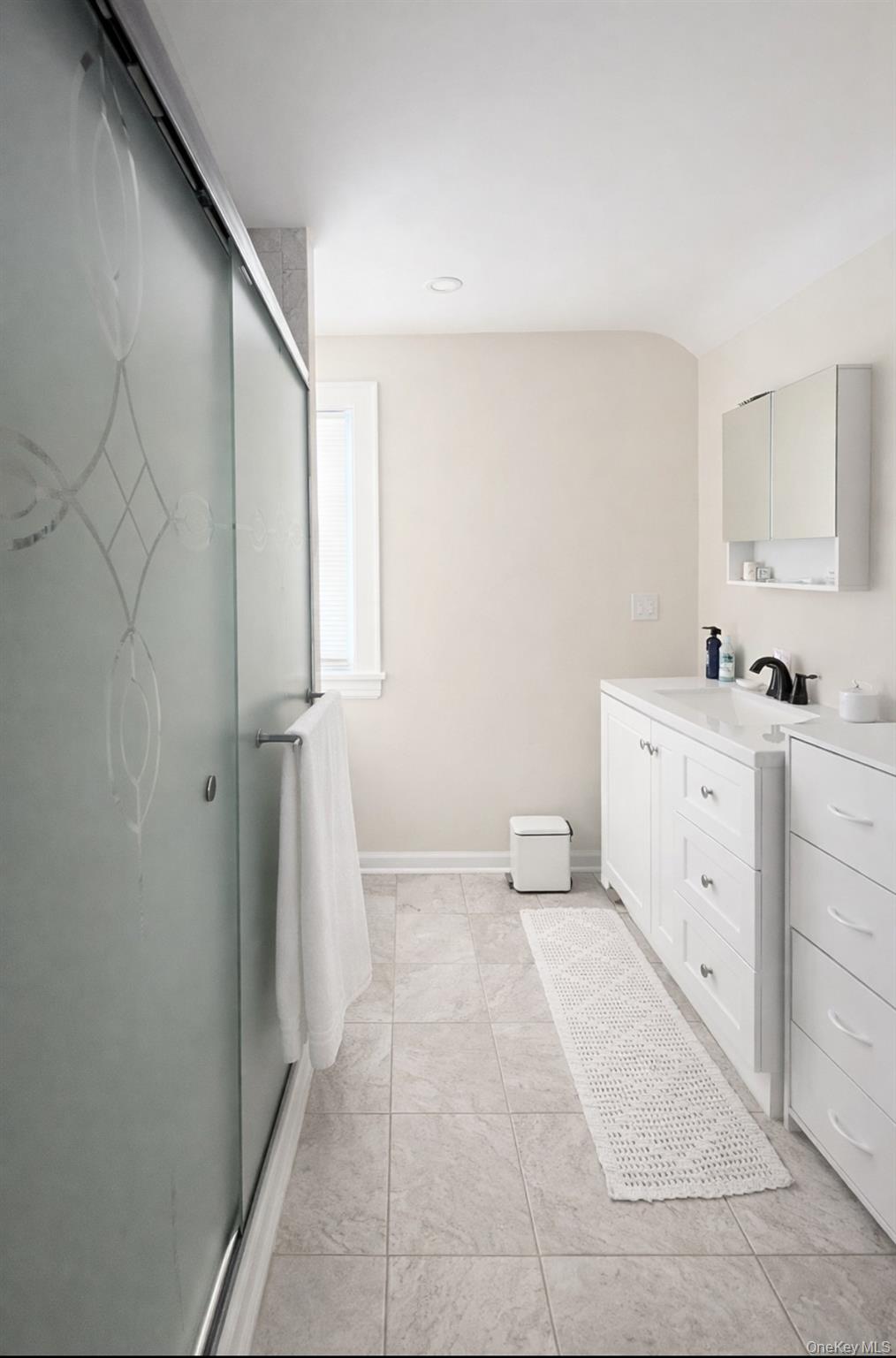 130 Clinton Avenue, Unit 3 New Rochelle, NY 10801 - Photo 10 of 10 a view of a kitchen with white cabinets