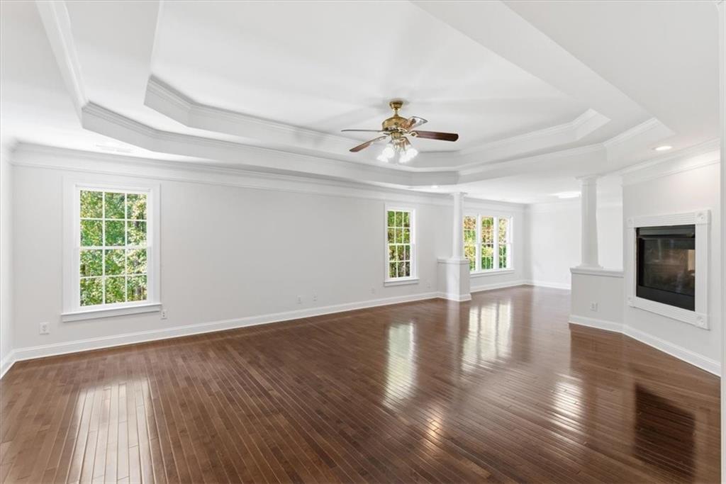 166 Windrift Drive Dallas, GA 30132 - Photo 25 of 72 a view of an empty room with wooden floor and a window