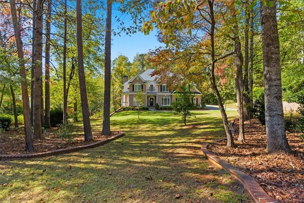 166 Windrift Drive Dallas, GA 30132 - Photo 3 of 72 a view of a house with a yard