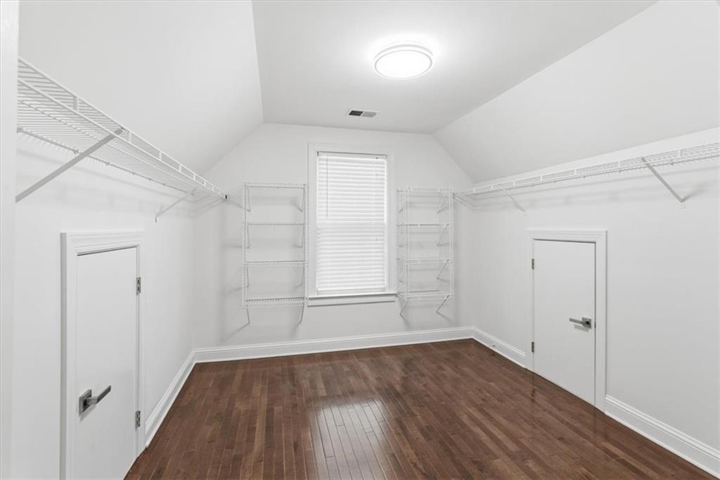 166 Windrift Drive Dallas, GA 30132 - Photo 35 of 72 an empty room with wooden floor and windows