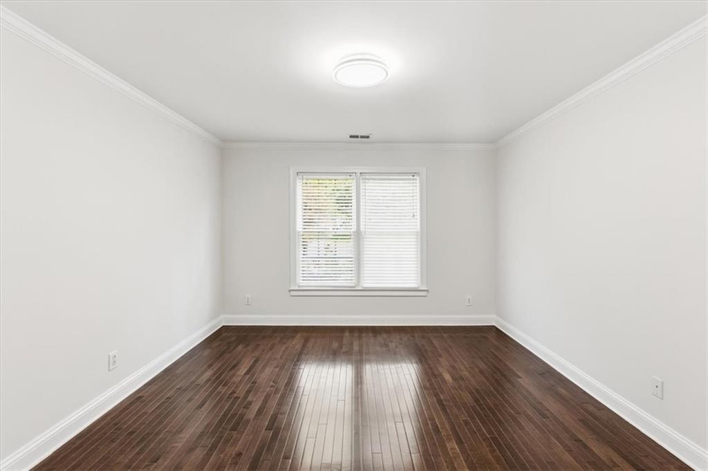 166 Windrift Drive Dallas, GA 30132 - Photo 38 of 72 an empty room with wooden floor and windows