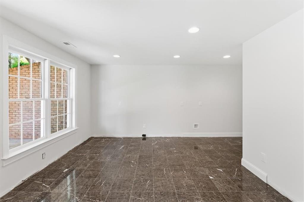 166 Windrift Drive Dallas, GA 30132 - Photo 50 of 72 an empty room with wooden floor and windows