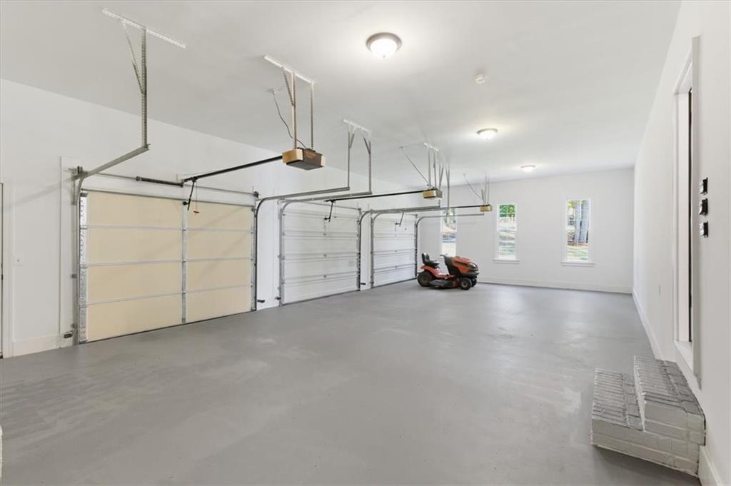 166 Windrift Drive Dallas, GA 30132 - Photo 56 of 72 a view of a car garage