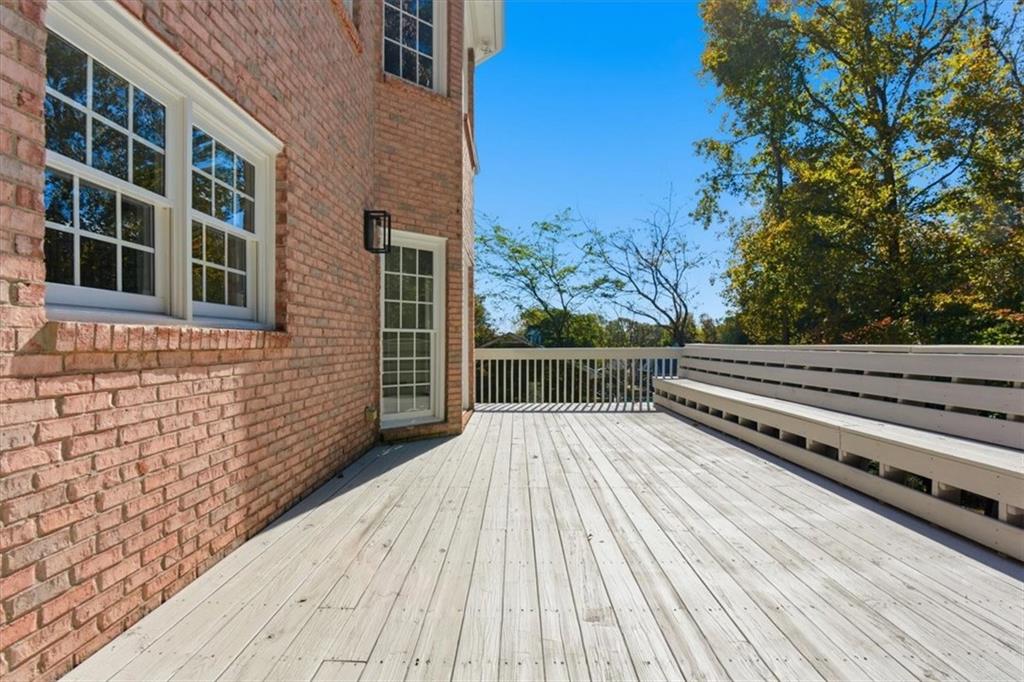 166 Windrift Drive Dallas, GA 30132 - Photo 59 of 72 a view of a balcony with wooden floor and fence