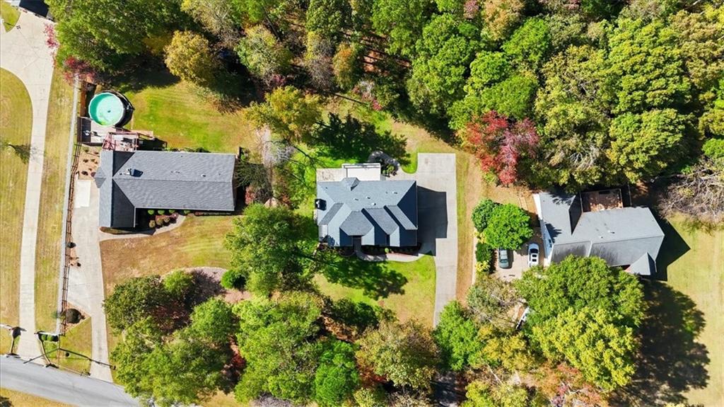 166 Windrift Drive Dallas, GA 30132 - Photo 66 of 72 an aerial view of a house with swimming pool and garden space