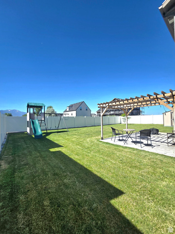 601 West 150 North, Unit 25 Springville, UT 84663 - Photo 29 of 29 Expansive green lawn with a white privacy fence