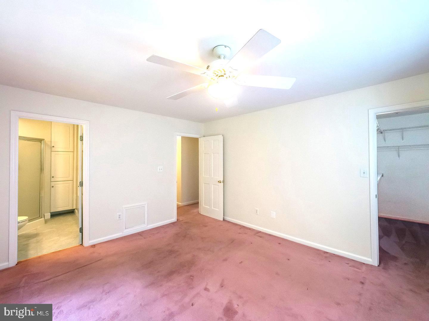 7701 Croom Road Upper Marlboro, MD 20772 - Photo 14 of 46 a view of an empty room with a window