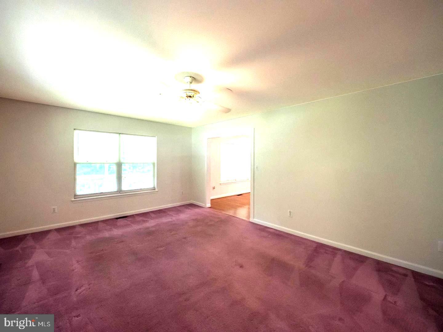 7701 Croom Road Upper Marlboro, MD 20772 - Photo 20 of 46 an empty room with a window