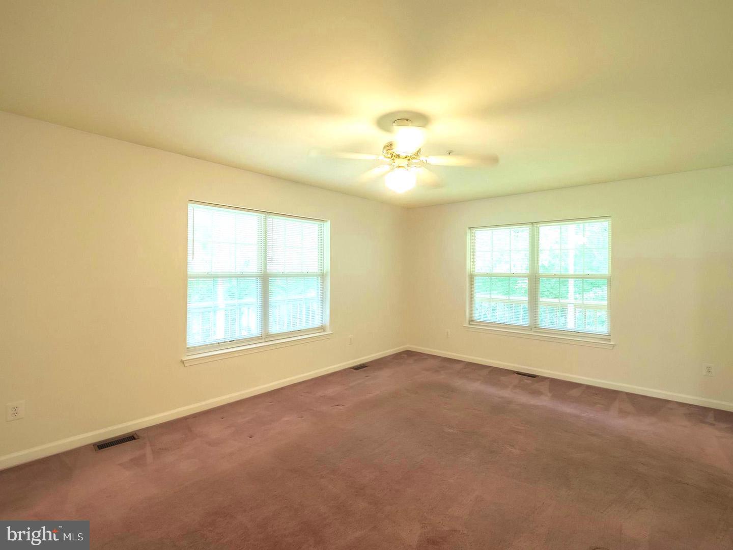 7701 Croom Road Upper Marlboro, MD 20772 - Photo 23 of 46 an empty room with a empty space and a window