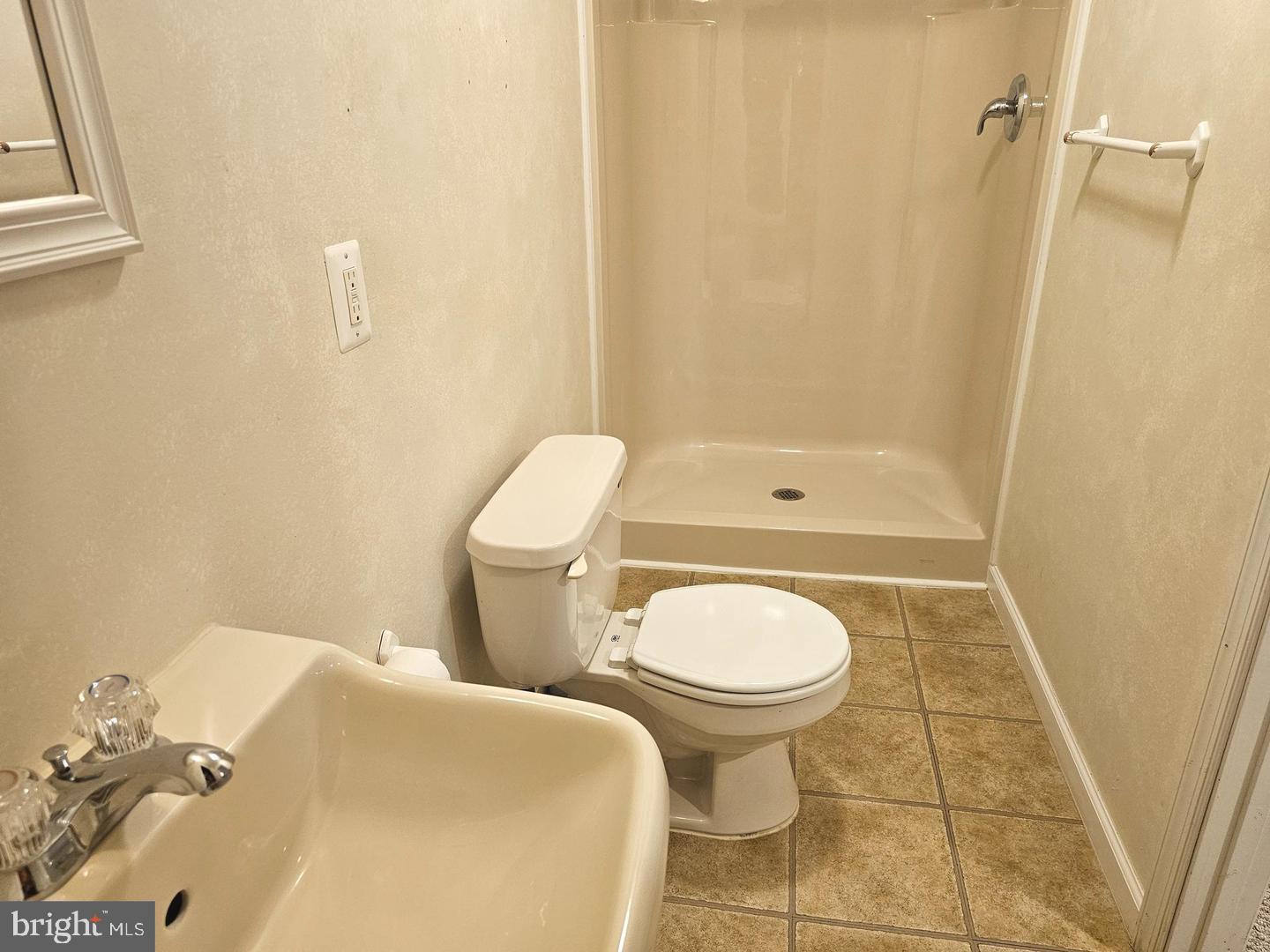 7701 Croom Road Upper Marlboro, MD 20772 - Photo 36 of 46 a bathroom with a sink and a toilet