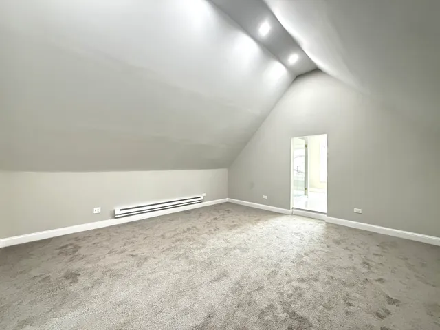 an empty room with a empty space and window