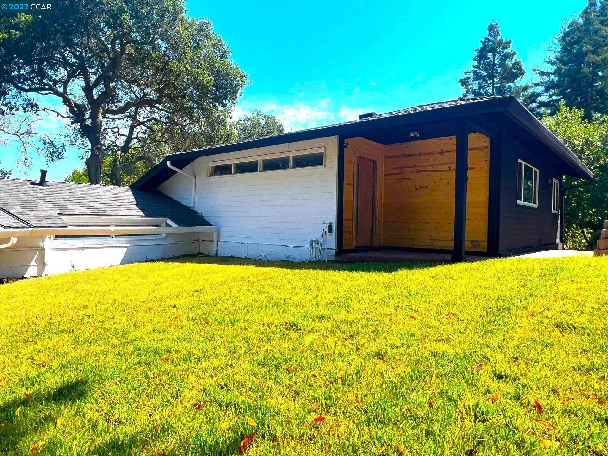 a house view with a outdoor space