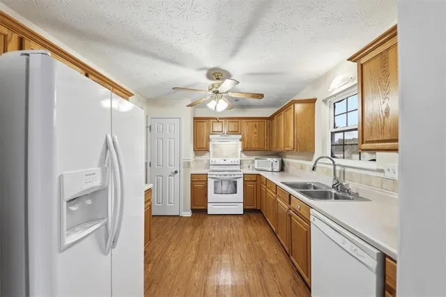 a bathroom with a shower and a sink