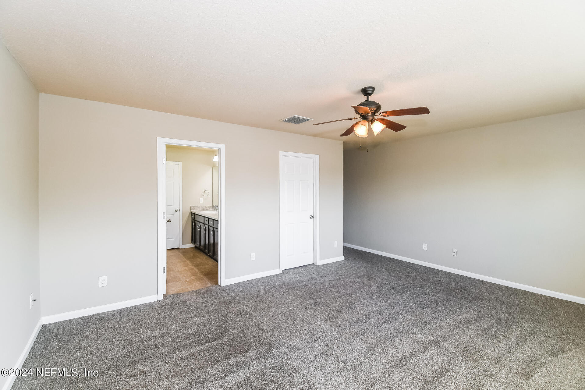 10201 Magnolia Ridge Road Jacksonville, FL 32210 - Photo 12 of 22 013-photo-main-bedroom-13843802