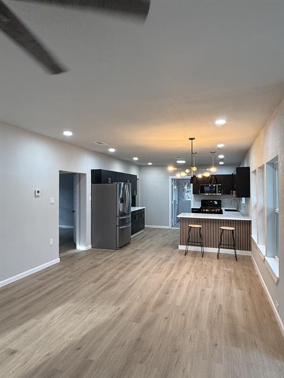 758 Bethpage Avenue Dallas, TX 75217 - Photo 9 of 20 a view of kitchen and microwave