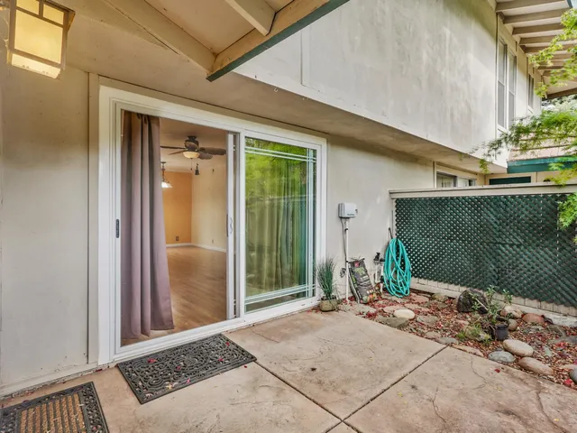 a side view of a pathway gate of a house