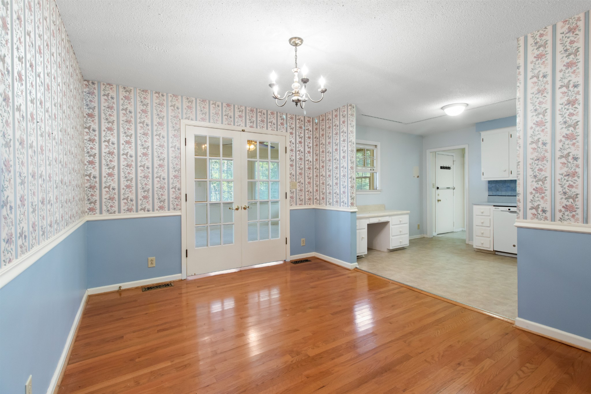 307 Revere Road Clarksville, TN 37043 - Photo 12 of 38 a view of an empty room with a window and wooden floor