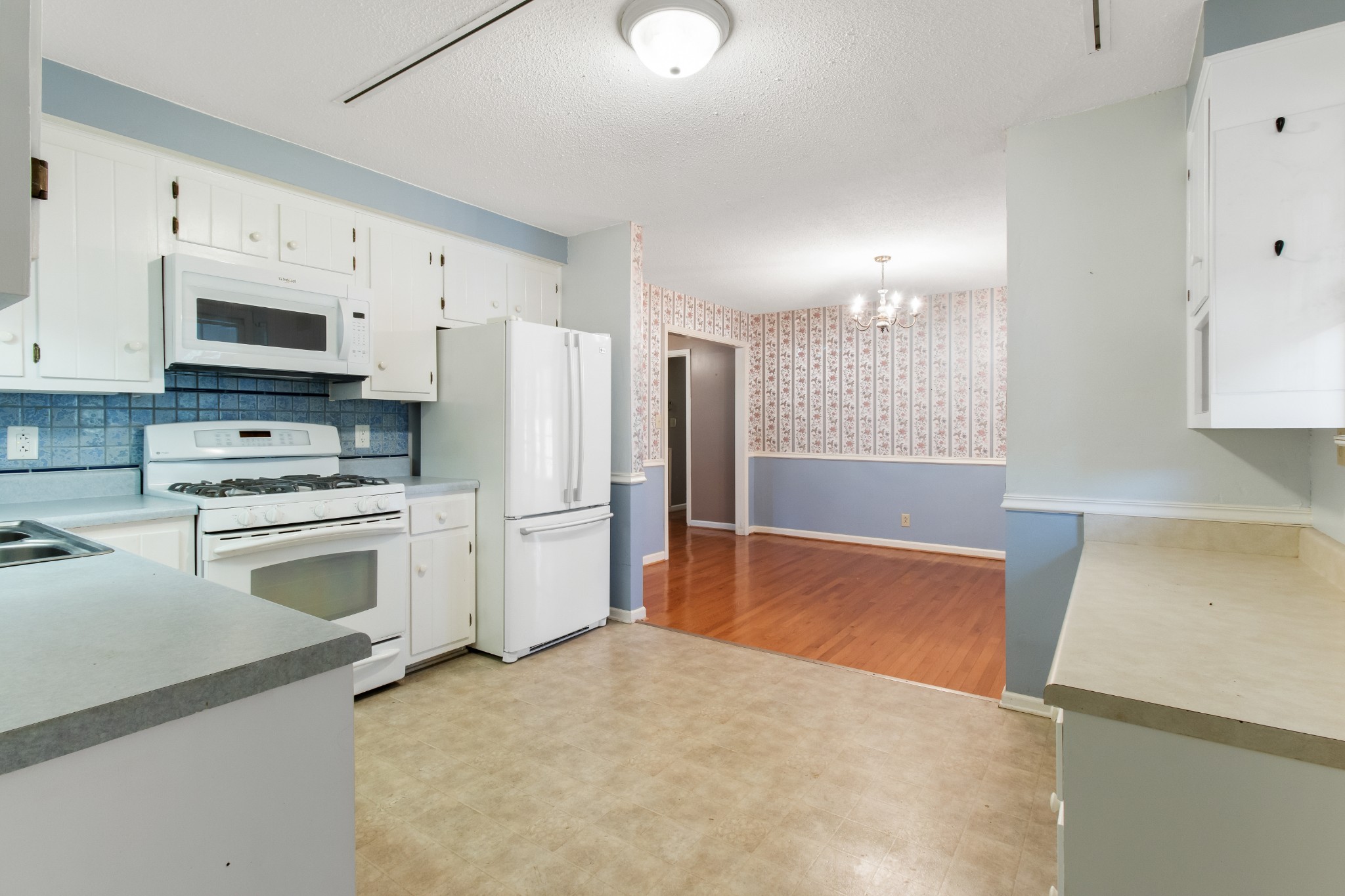 307 Revere Road Clarksville, TN 37043 - Photo 16 of 38 a kitchen with stainless steel appliances a refrigerator sink and stove