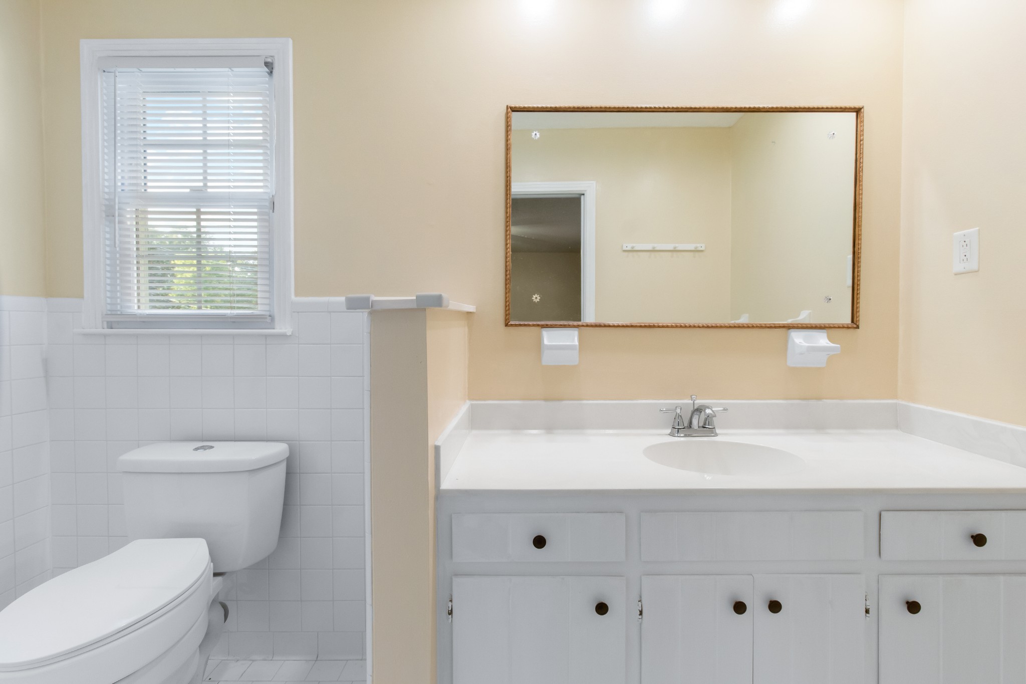 307 Revere Road Clarksville, TN 37043 - Photo 24 of 38 a bathroom with a sink a toilet and a mirror