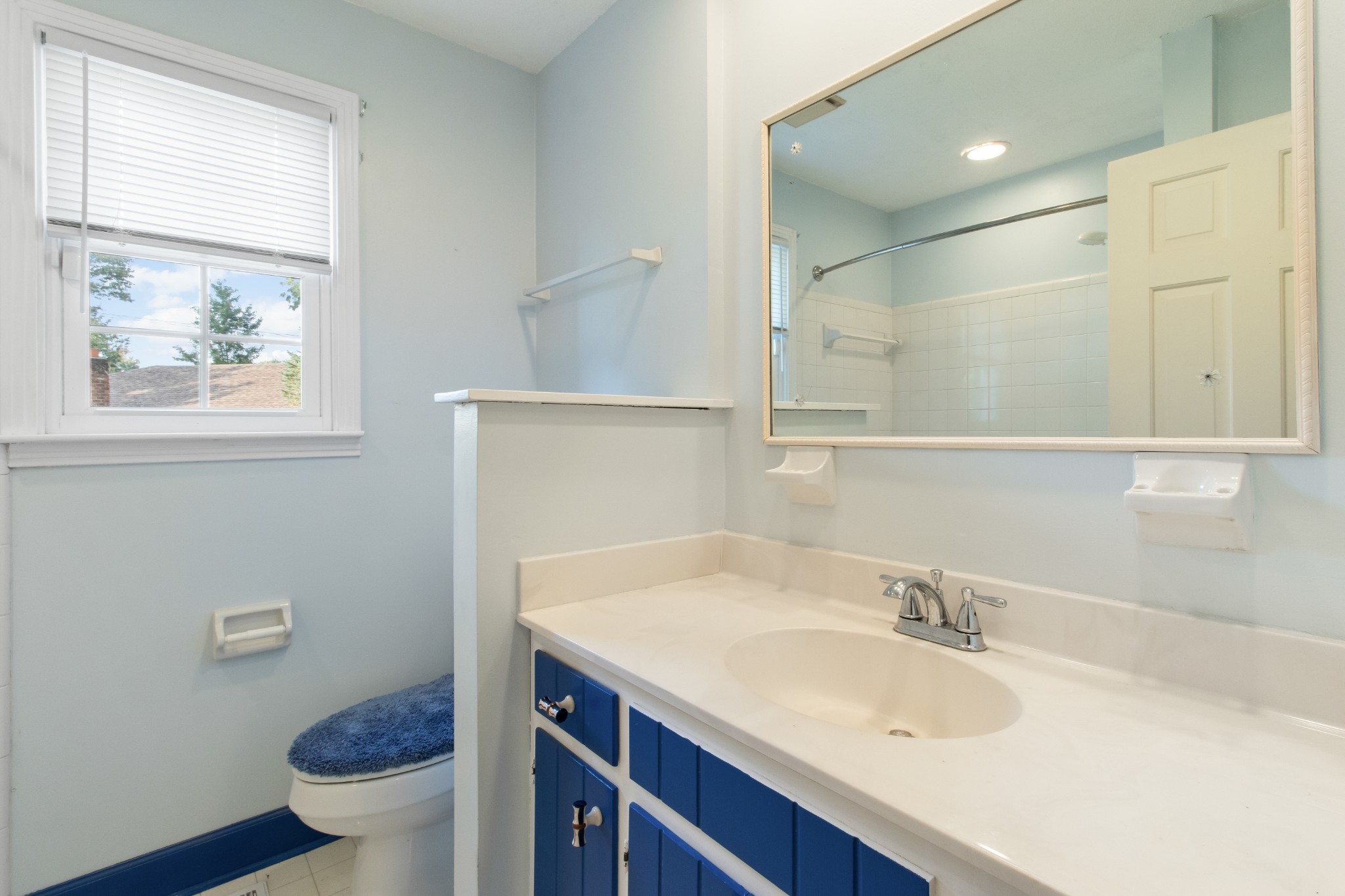 307 Revere Road Clarksville, TN 37043 - Photo 26 of 38 a bathroom with a granite countertop sink toilet and a mirror