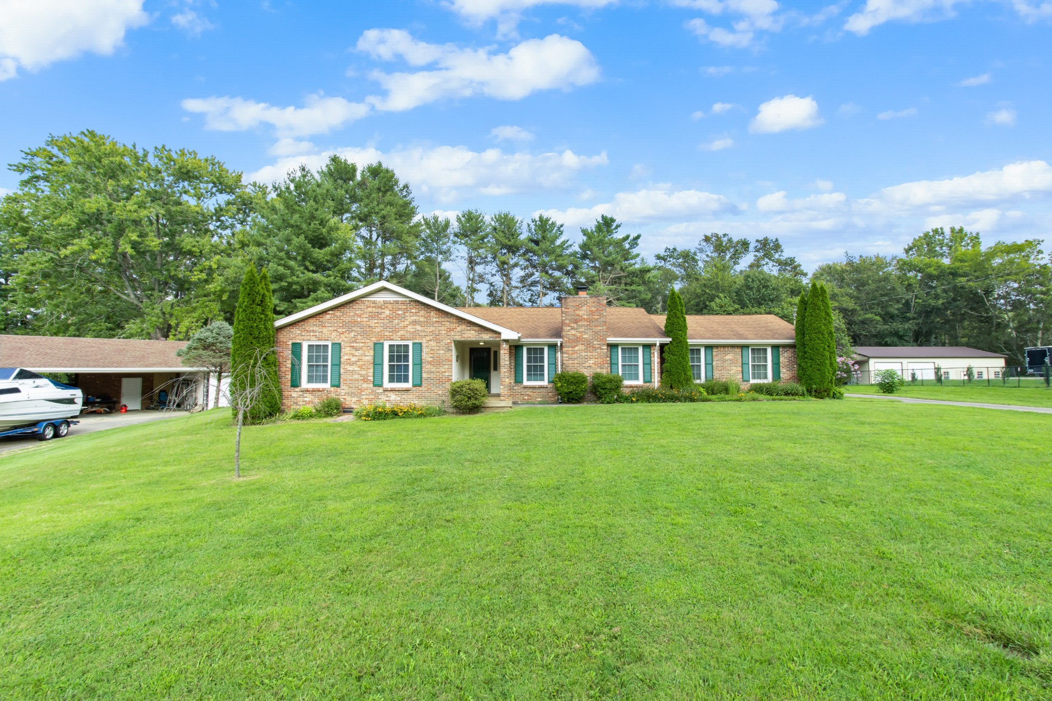 307 Revere Road Clarksville, TN 37043 - Photo 3 of 38 a front view of a house with a garden
