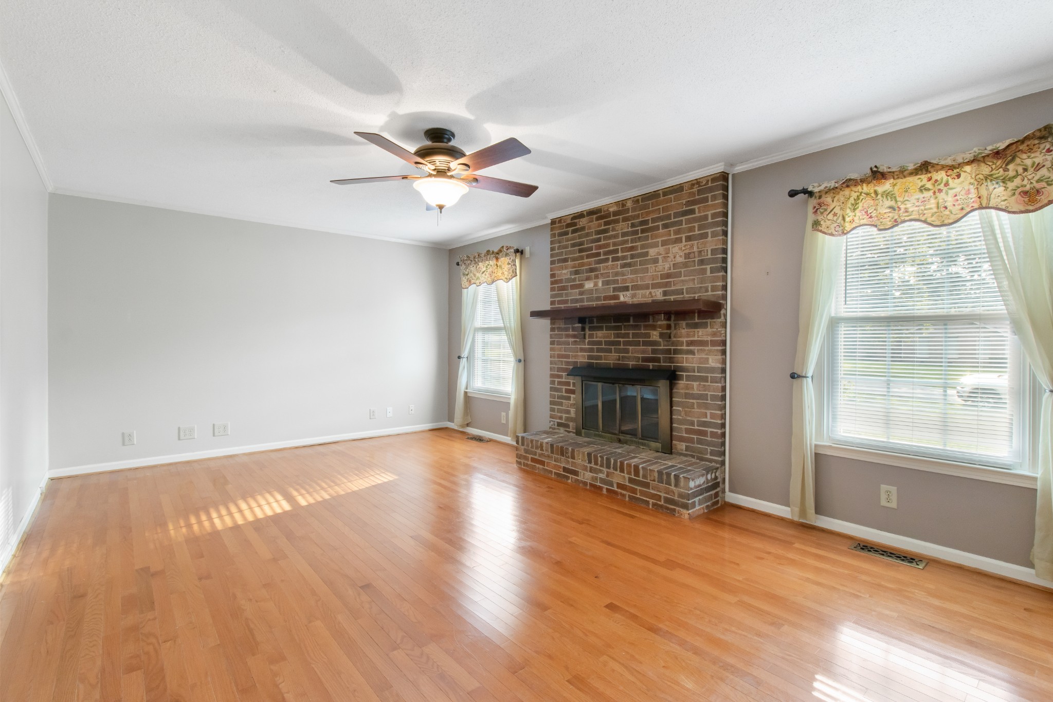 307 Revere Road Clarksville, TN 37043 - Photo 10 of 38 a view of empty room with wooden floor and fan