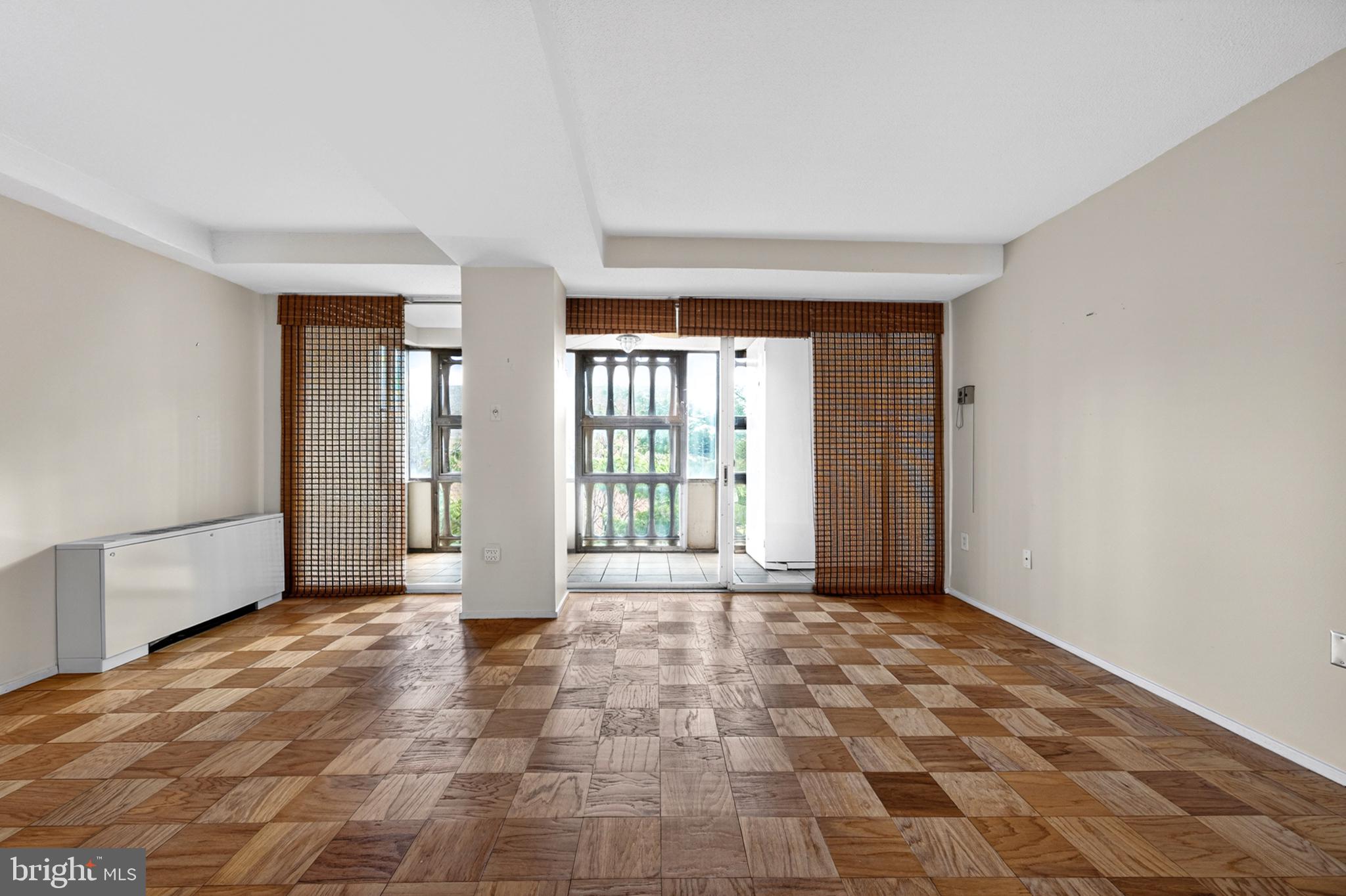 1311 Delaware Avenue Southwest, Unit S231 Washington, DC 20024 - Photo 11 of 74 a view of an empty room with a window