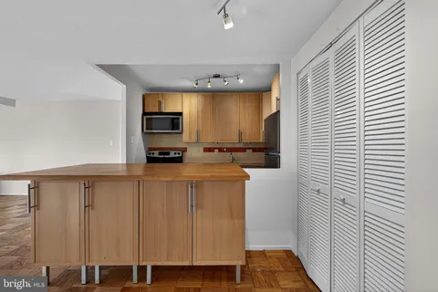 a view of a kitchen with a sink