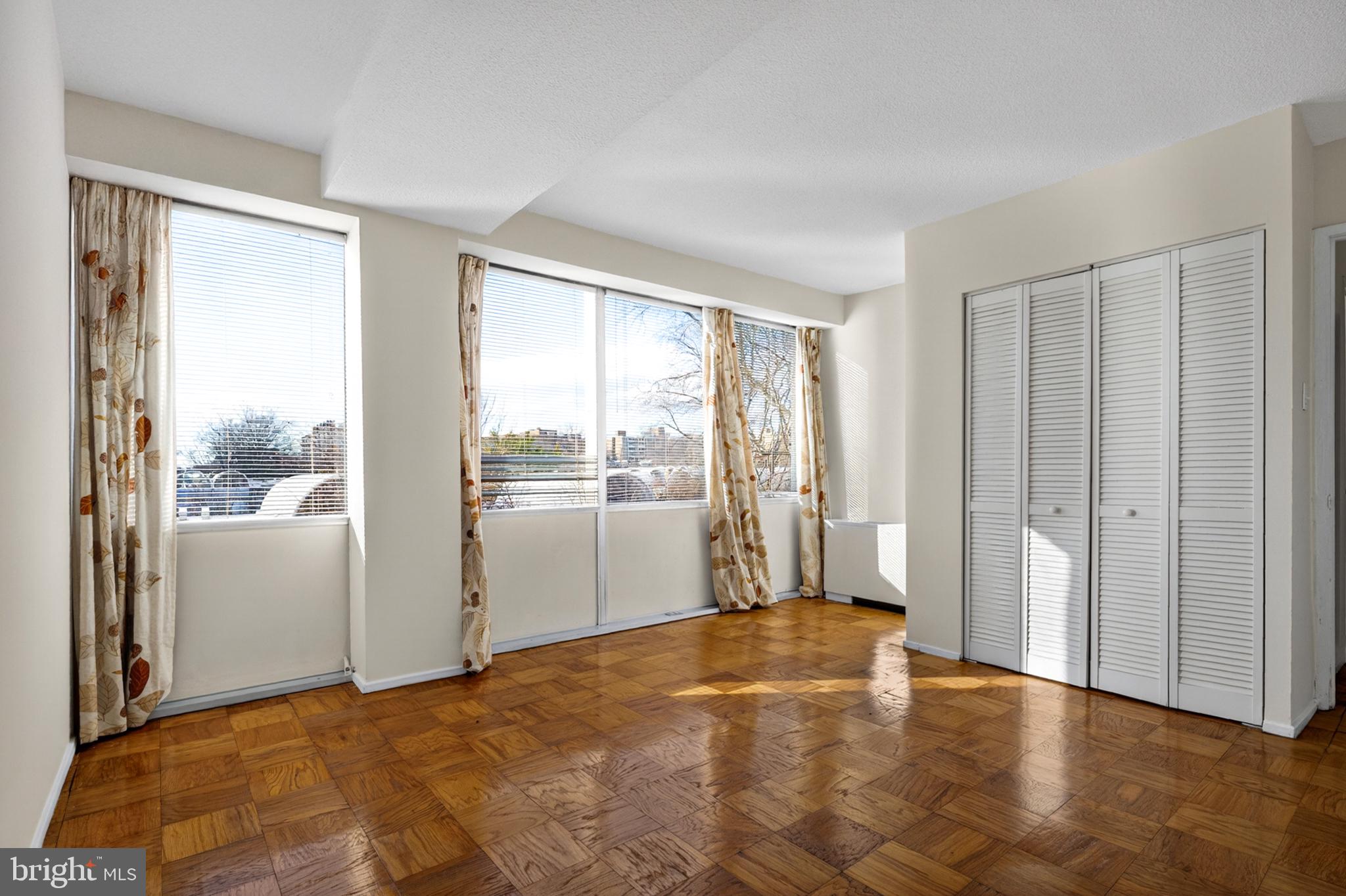 1311 Delaware Avenue Southwest, Unit S231 Washington, DC 20024 - Photo 20 of 74 a view of an empty room with a window