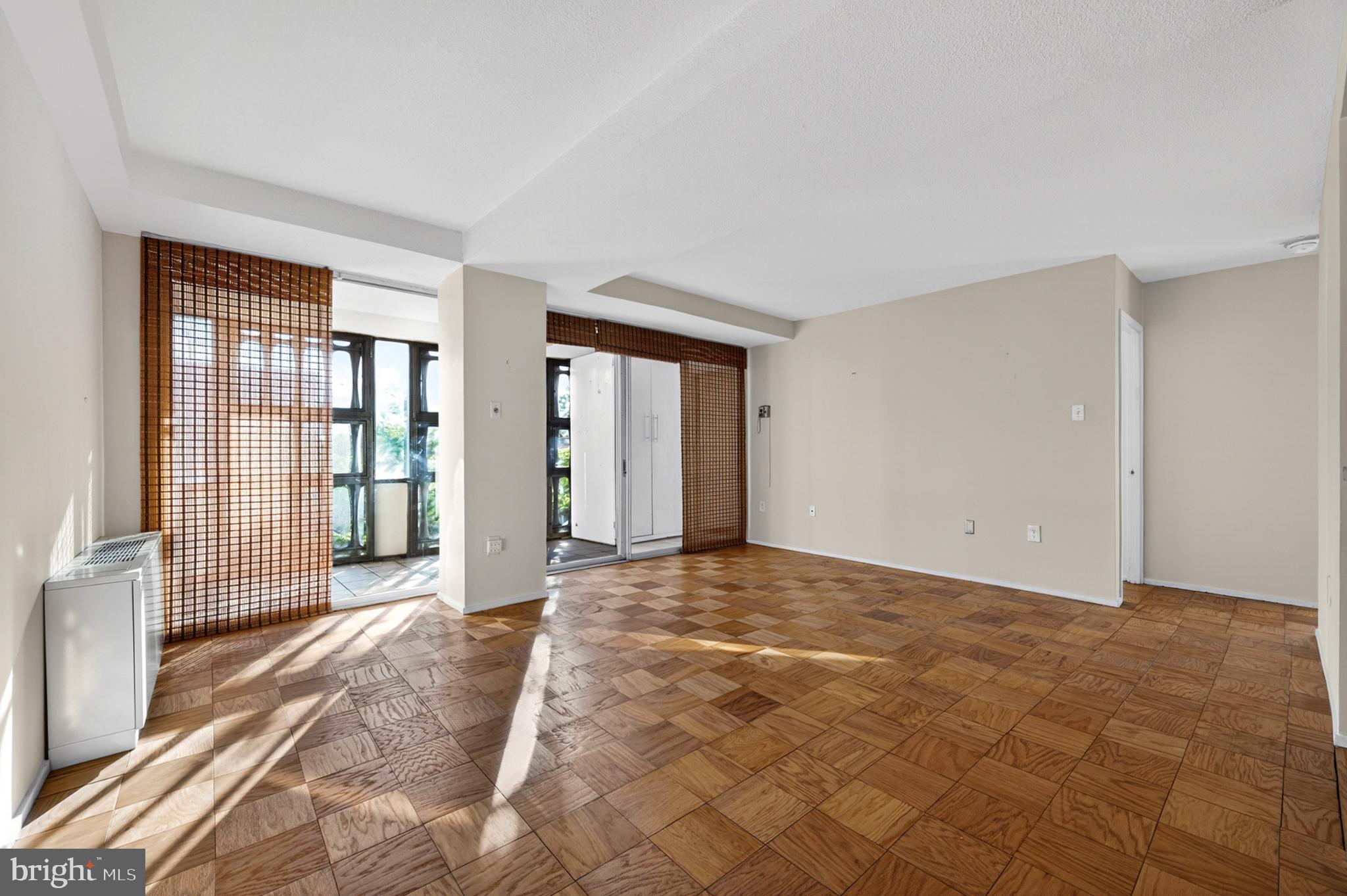 1311 Delaware Avenue Southwest, Unit S231 Washington, DC 20024 - Photo 10 of 74 a view of an empty room with window