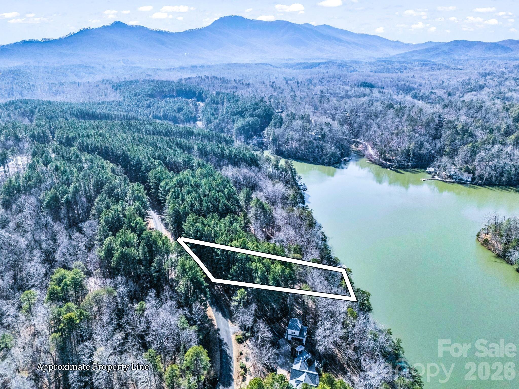 0 Hawk Ridge Drive, Unit 8 Mill Spring, NC 28756 - Photo 7 of 15 an aerial view of house with yard