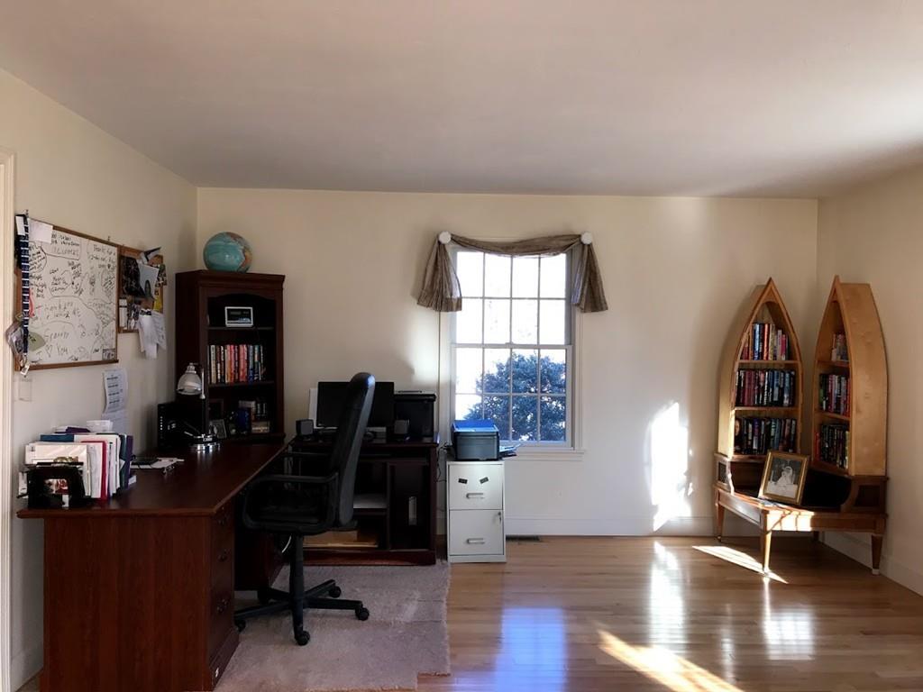 48 Catacunemaug Road Shirley, MA 01464 - Photo 19 of 28 a view of a workspace with furniture and wooden floor