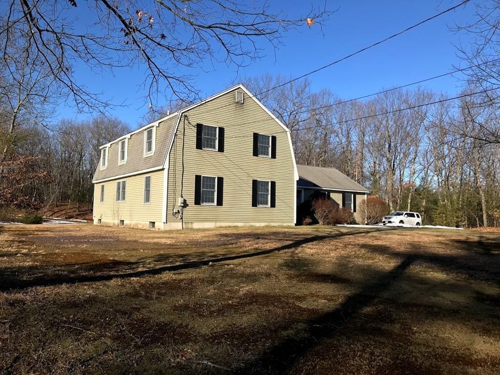 48 Catacunemaug Road Shirley, MA 01464 - Photo 4 of 28 a view of a house with a yard