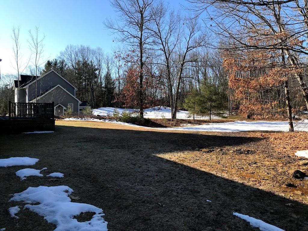 48 Catacunemaug Road Shirley, MA 01464 - Photo 6 of 28 a view of a lake with a yard