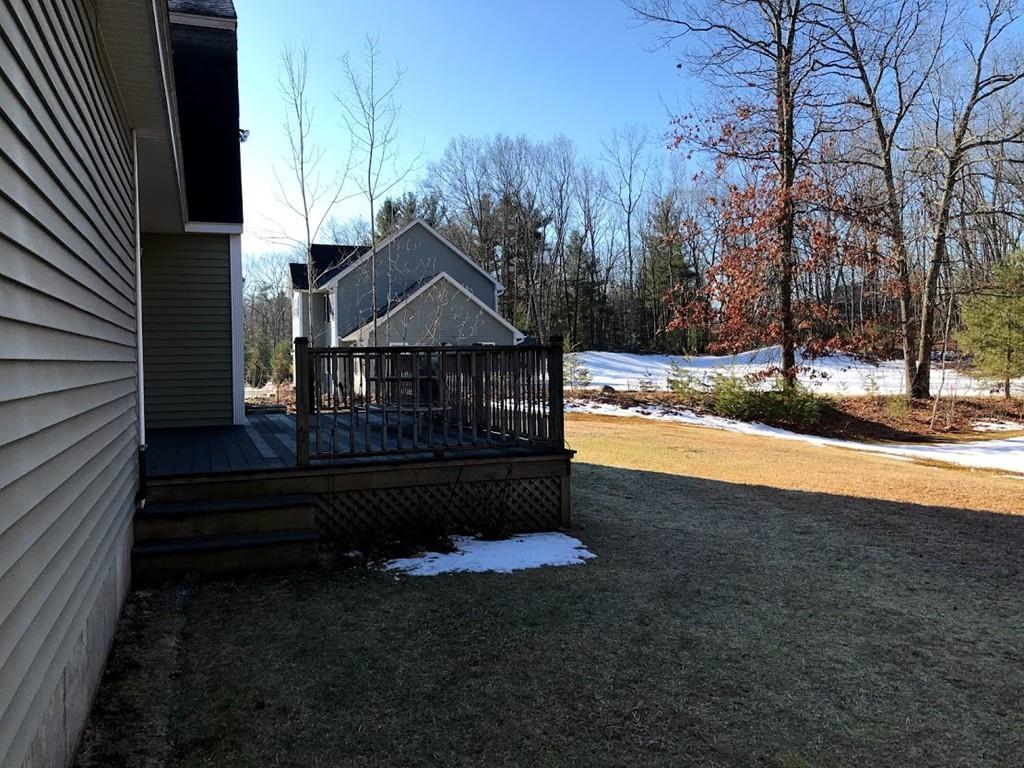 48 Catacunemaug Road Shirley, MA 01464 - Photo 10 of 28 a view of a house with backyard and trees
