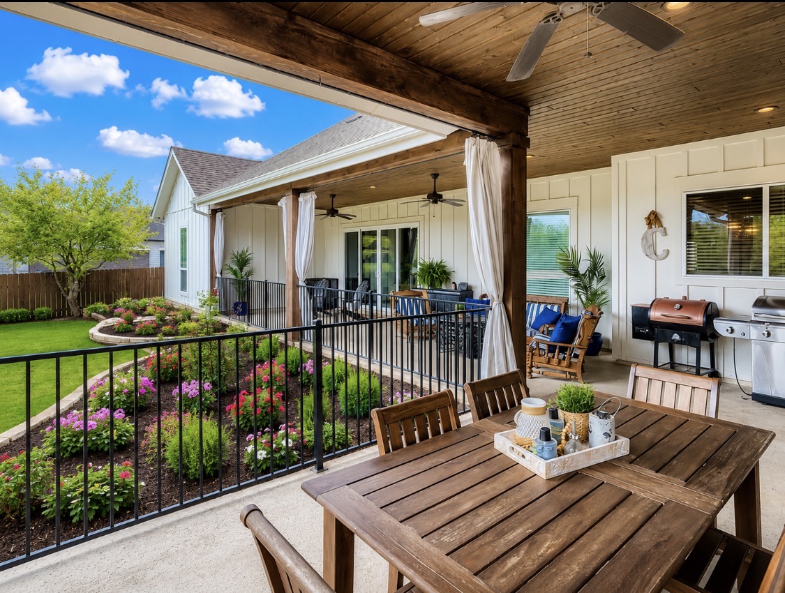 132 Huerta Road Florence, TX 76527 - Photo 29 of 38 a view of a patio with couches table and chairs and potted plants