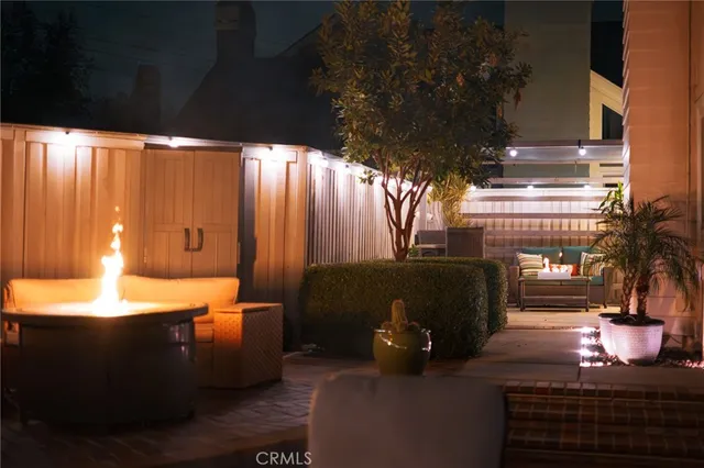 a living room with furniture and a pool