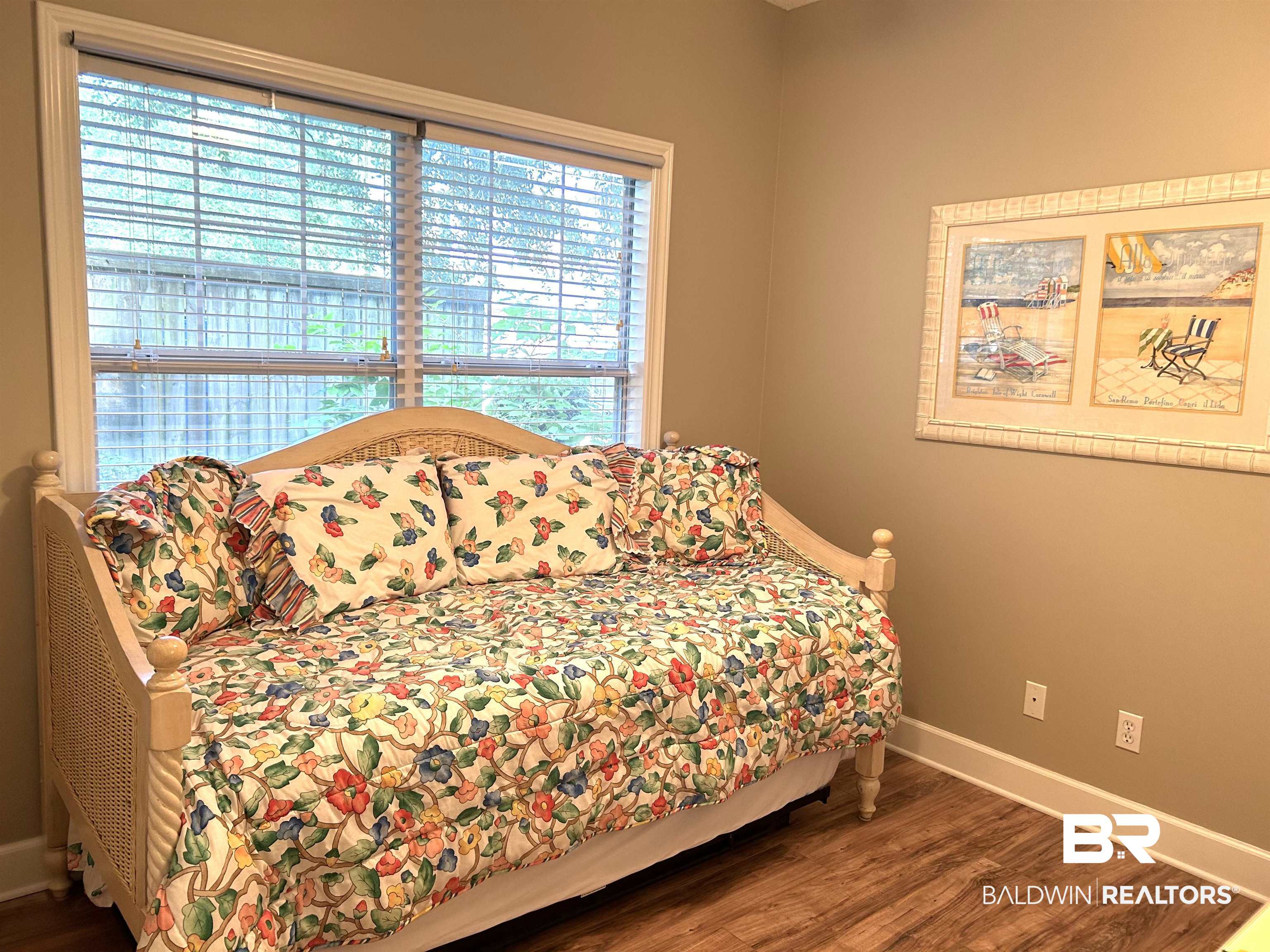 430 West Fort Morgan Road, Unit 404 Gulf Shores, AL 36542 - Photo 22 of 31 Bedroom with dark wood-type flooring