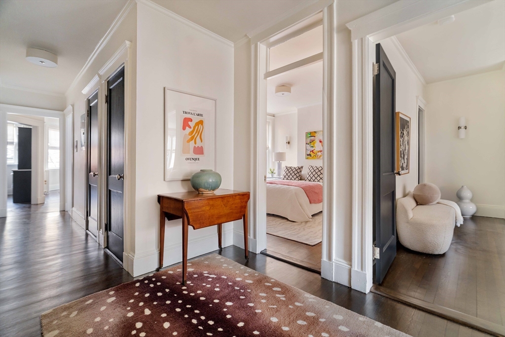 4 Newport Road, Unit 7 Cambridge, MA 02140 - Photo 13 of 31 a bedroom with furniture and a gate