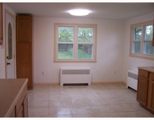 619 Beatty Road Monroeville, PA 15146 - Photo 6 of 18 Kitchen. Large kitchen provides sunny breakfast nook area overlooking spacious back yard complete with fruit trees and grape arbors! Ceramic floor is beautiful! Floor to ceiling pantry provides lots of space for storage! Door leads to covered rear patio & yard!