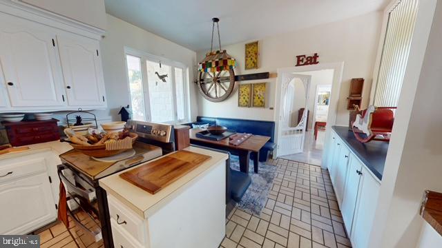 19 Valley Road Lewistown, PA 17044 - Photo 15 of 37 a living room with fireplace furniture and a window